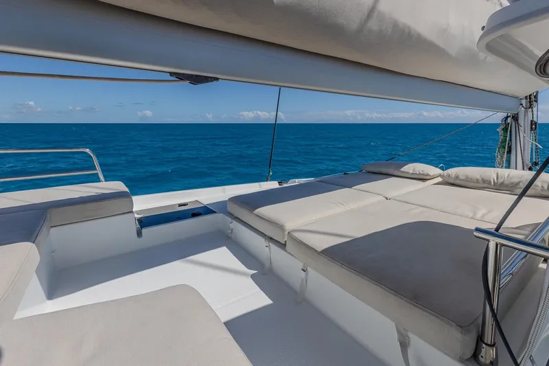 Happy Here Yacht Photos Pics Luxurious 2020 Fountaine Pajot Saona 47 catamaran deck with ocean view.