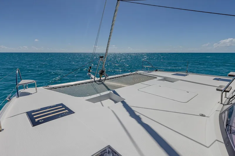 Happy Here Yacht Photos Pics 2020 Fountaine Pajot Saona 47 catamaran deck with ocean view.