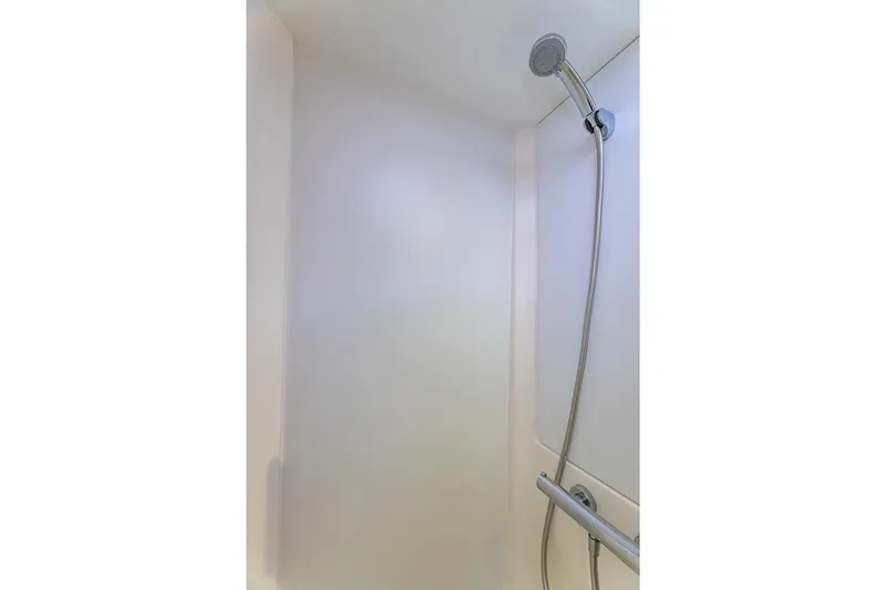 Happy Here Yacht Photos Pics Shower area in 2020 Fountaine Pajot Saona 47 yacht, featuring modern fixtures.