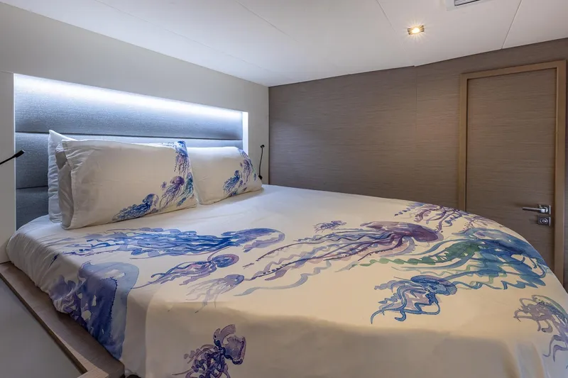 Happy Here Yacht Photos Pics Luxurious bedroom in 2020 Fountaine Pajot Saona 47 yacht with jellyfish-themed bedding.