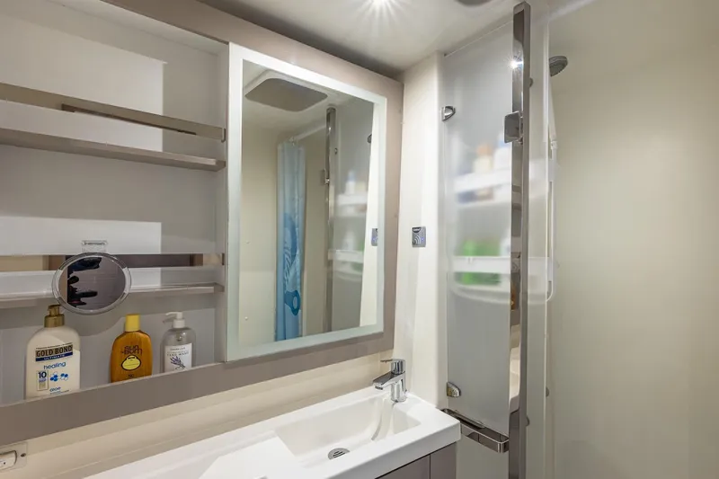 Happy Here Yacht Photos Pics Modern bathroom in 2020 Fountaine Pajot Saona 47 yacht with sleek fixtures and storage.