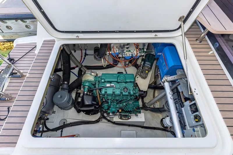 Happy Here Yacht Photos Pics Engine compartment of 2020 Fountaine Pajot Saona 47 catamaran, showcasing mechanical components.