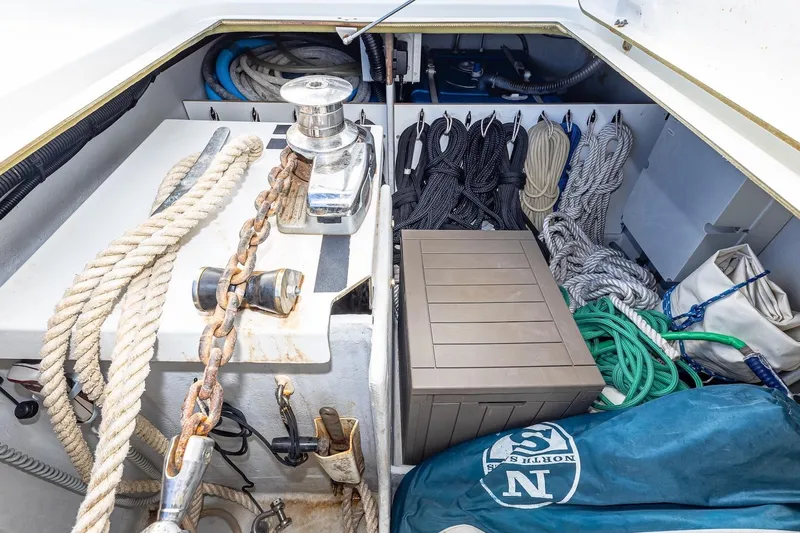 Happy Here Yacht Photos Pics Storage compartment of 2020 Fountaine Pajot Saona 47 with ropes and anchor chain.