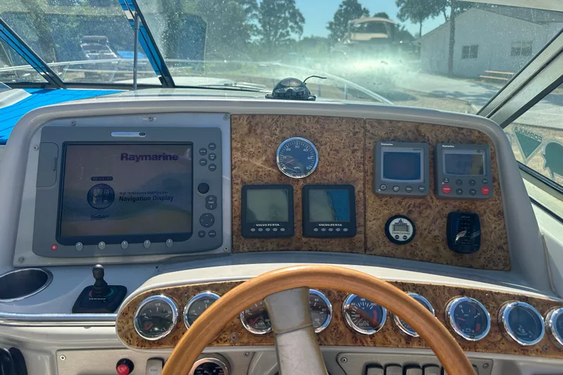  Yacht Photos Pics Dashboard of a 2007 Formula 400 Super Sport boat with navigation display and gauges.
