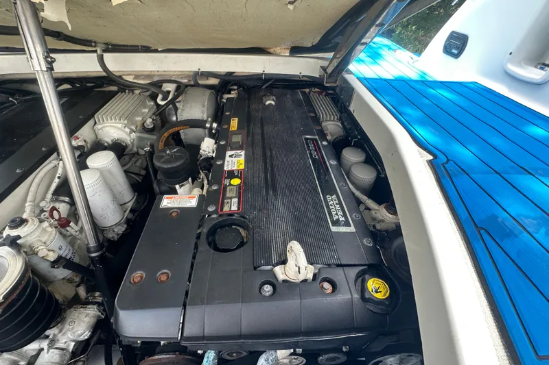  Yacht Photos Pics Engine compartment of a 2007 Formula 400 Super Sport boat, showcasing detailed components.