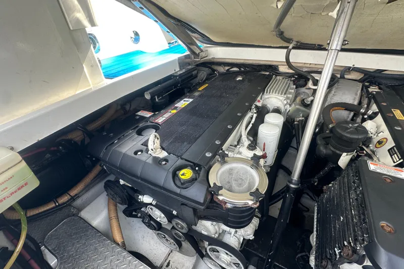  Yacht Photos Pics Engine compartment of a 2007 Formula 400 Super Sport boat, showcasing mechanical components.
