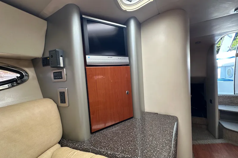  Yacht Photos Pics Interior of 2007 Formula 400 Super Sport yacht with TV and seating area.