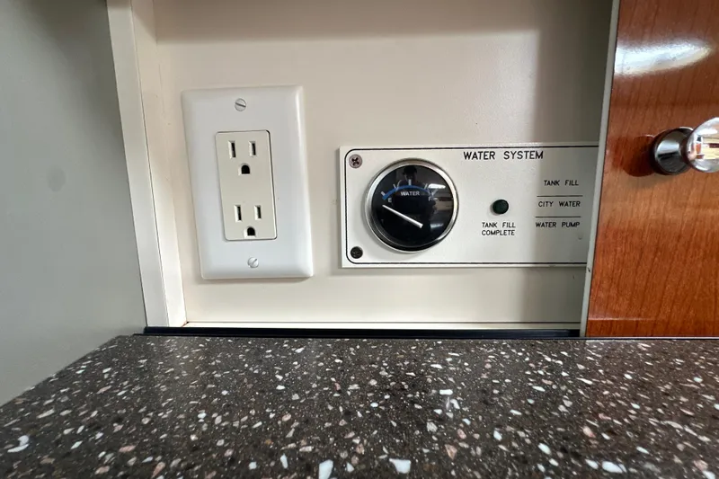  Yacht Photos Pics Water system control panel and outlet in 2007 Formula 400 Super Sport boat.