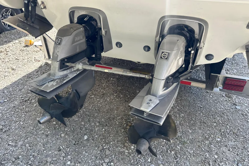  Yacht Photos Pics 2007 Formula 400 Super Sport boat with dual outboard motors on gravel.