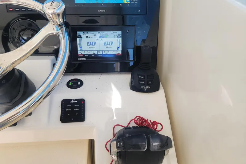  Yacht Photos Pics 2021 Pursuit DC 326 Dual Console boat dashboard with Garmin and Yamaha controls.