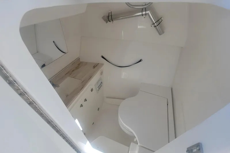  Yacht Photos Pics 2021 Pursuit DC 326 Dual Console boat interior with modern amenities.