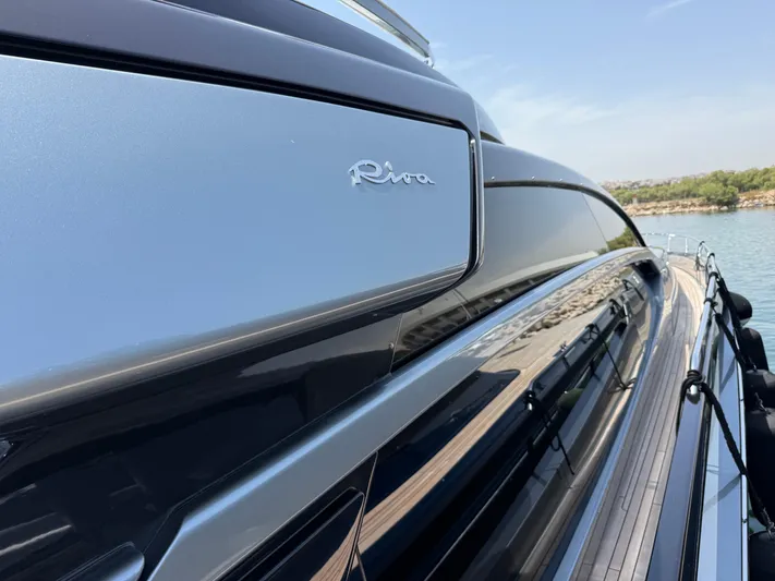  Yacht Photos Pics 2022 Riva 76' Perseo Super yacht, sleek design, docked by the water.