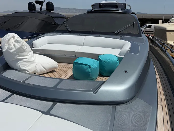  Yacht Photos Pics Luxurious 2022 Riva 76' Perseo Super yacht with elegant deck seating and turquoise accents.