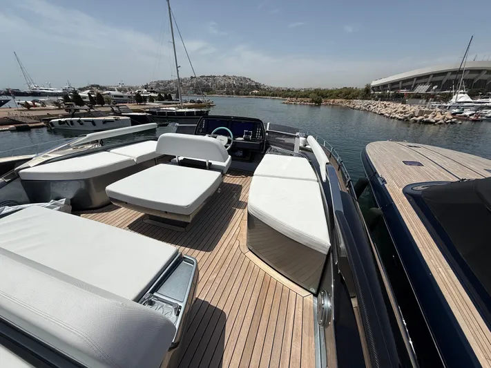  Yacht Photos Pics Luxurious 2022 Riva 76' Perseo Super yacht with spacious deck and elegant seating.