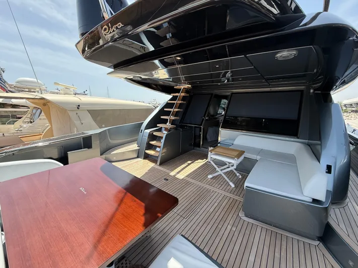  Yacht Photos Pics Luxurious 2022 Riva 76' Perseo Super yacht deck with seating and table.