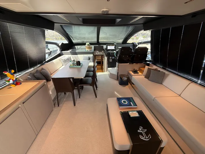  Yacht Photos Pics Luxurious interior of 2022 Riva 76' Perseo Super yacht with elegant seating and dining area.