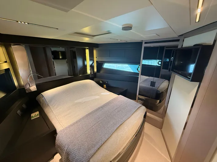  Yacht Photos Pics Luxurious bedroom interior of 2022 Riva 76' Perseo Super yacht with modern design.