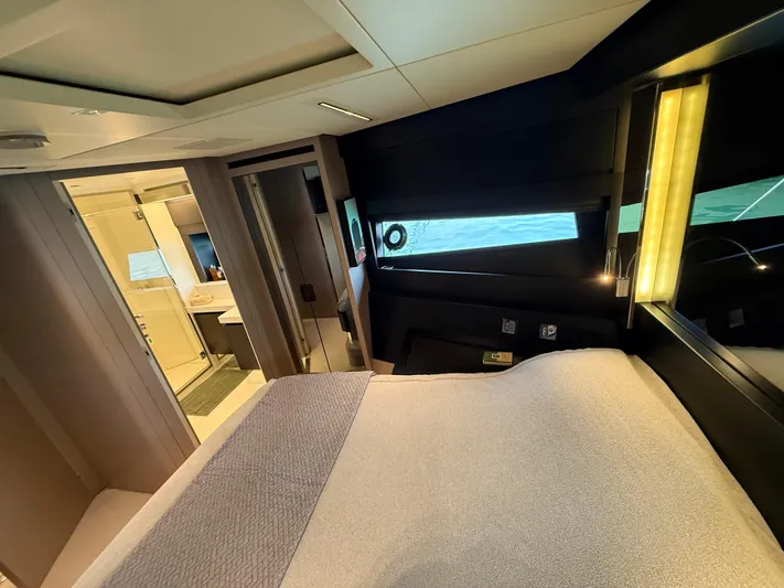  Yacht Photos Pics Luxurious bedroom interior of 2022 Riva 76' Perseo Super yacht with modern design.