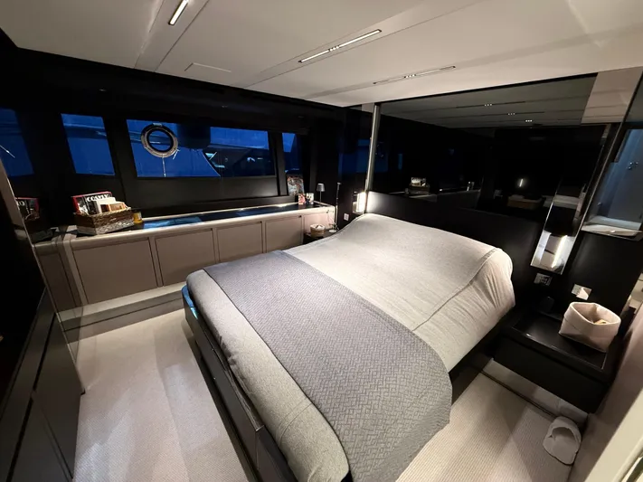  Yacht Photos Pics Luxurious bedroom interior of 2022 Riva 76' Perseo Super yacht with modern design.