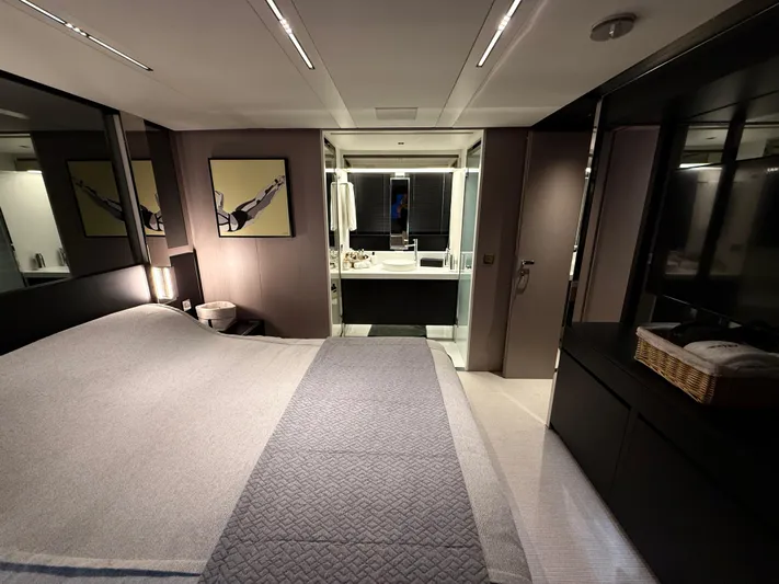  Yacht Photos Pics Luxurious bedroom interior of 2022 Riva 76' Perseo Super yacht with modern decor.