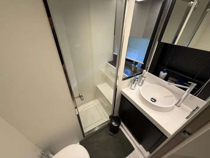  Yacht Photos Pics Modern bathroom on 2022 Riva 76' Perseo Super yacht with sleek shower and vanity.