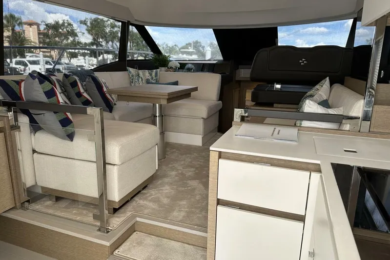 Our Trade Yacht Photos Pics Luxurious interior of 2024 Prestige 460 yacht with elegant seating and modern design.