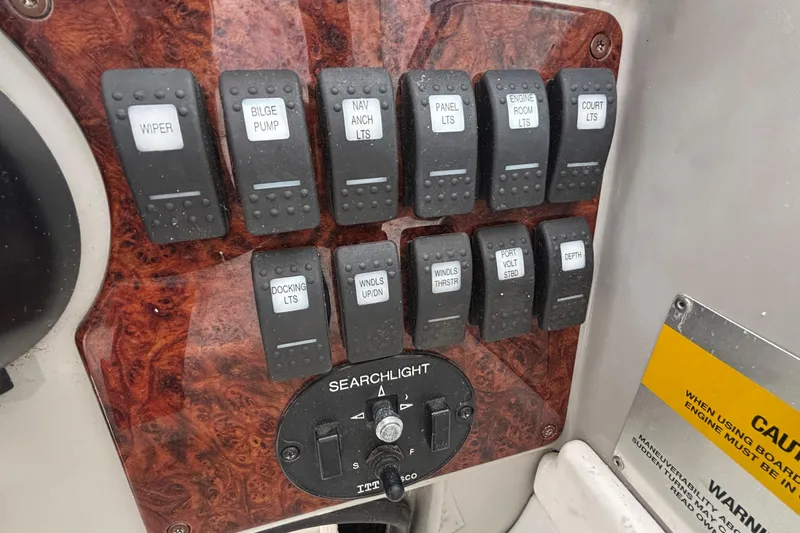  Yacht Photos Pics Control panel of a 2005 Formula 31 Performance Cruiser with labeled switches.