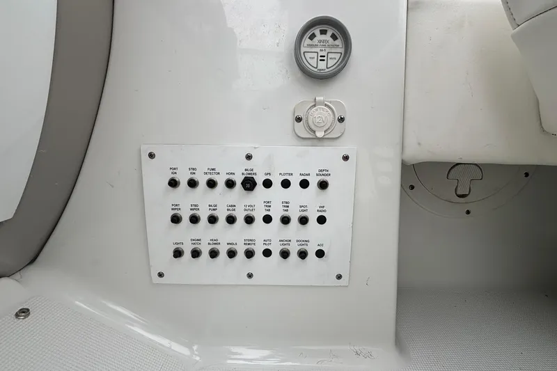 Yacht Photos Pics Control panel of a 2005 Formula 31 Performance Cruiser with various switches and gauges.