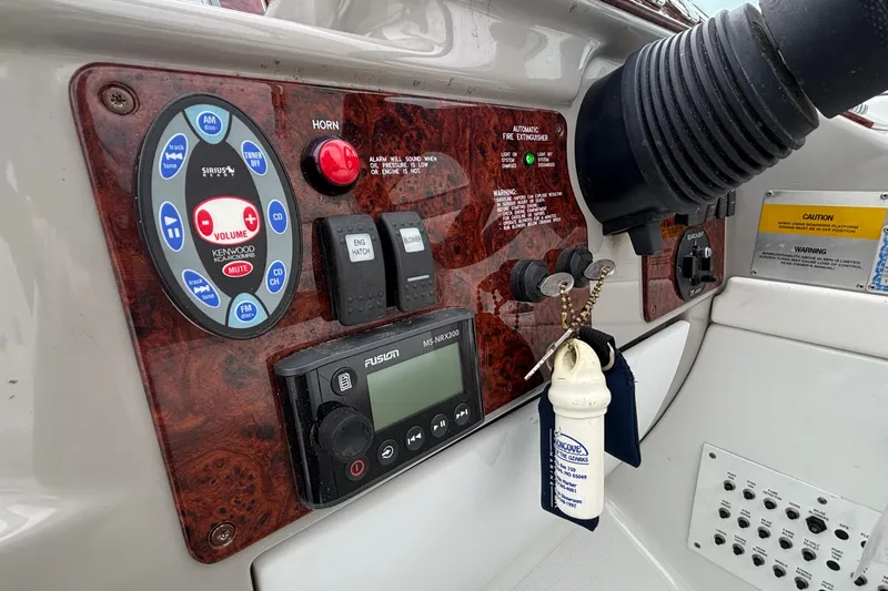  Yacht Photos Pics Control panel of a 2005 Formula 31 Performance Cruiser with audio and safety features.