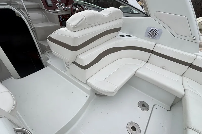  Yacht Photos Pics 2005 Formula 31 Performance Cruiser interior with white seating and dashboard.