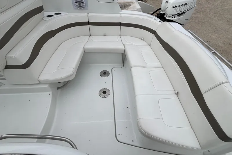  Yacht Photos Pics 2005 Formula 31 Performance Cruiser interior with white seating and brown accents.