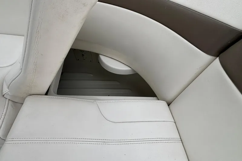  Yacht Photos Pics 2005 Formula 31 Performance Cruiser interior seating detail, featuring white and brown upholstery.