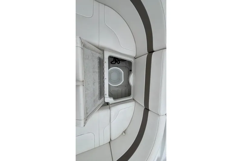  Yacht Photos Pics 2005 Formula 31 Performance Cruiser interior storage compartment with white and gray seating.