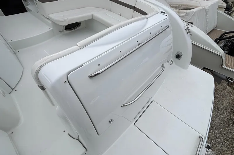  Yacht Photos Pics 2005 Formula 31 Performance Cruiser interior with white seating and sleek design.