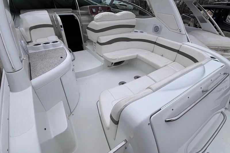  Yacht Photos Pics 2005 Formula 31 Performance Cruiser interior with white seating and sleek design.