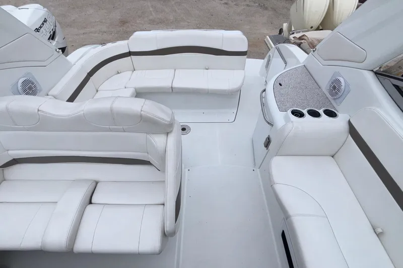  Yacht Photos Pics 2005 Formula 31 Performance Cruiser interior with white seating and cup holders.