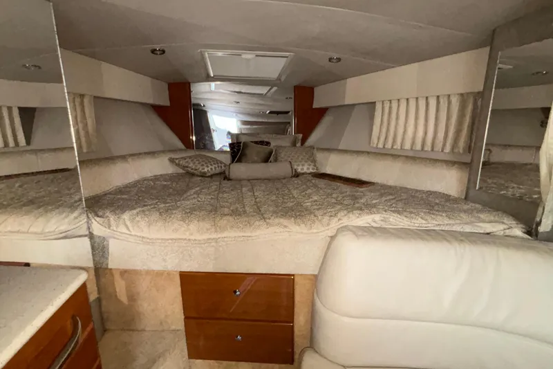  Yacht Photos Pics Interior of 2005 Formula 31 Performance Cruiser with cozy bed and elegant decor.
