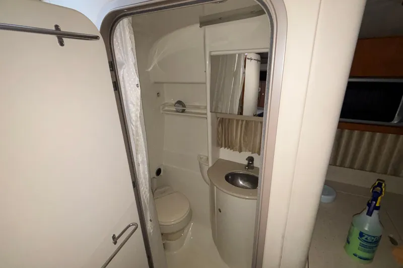  Yacht Photos Pics 2005 Formula 31 Performance Cruiser bathroom with sink, toilet, and shower.