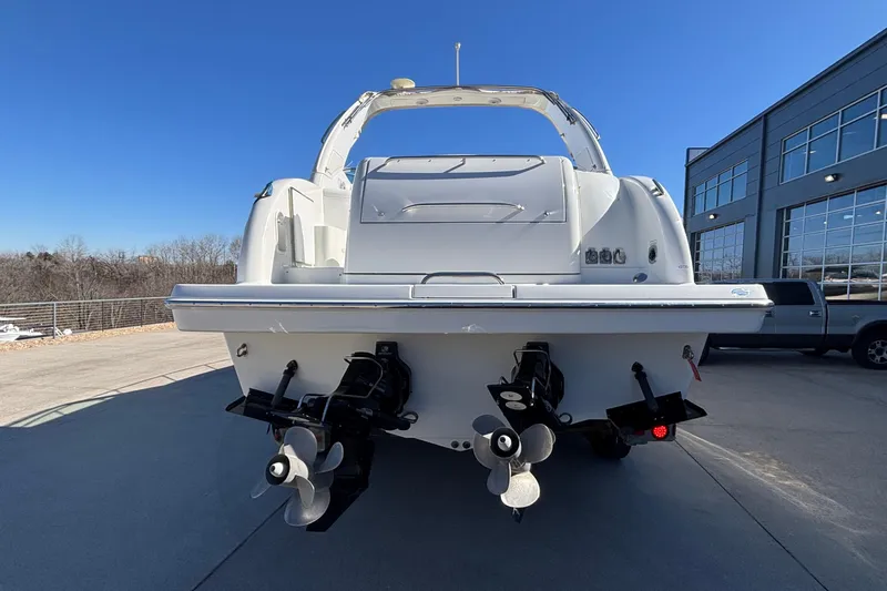  Yacht Photos Pics 2005 Formula 31 Performance Cruiser boat, rear view, parked outdoors under clear blue sky.
