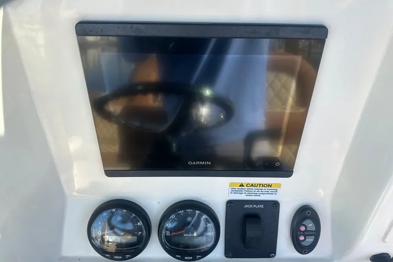 O-sea-d 2 Yacht Photos Pics 2021 Scout 251 XSS boat dashboard with Garmin display and gauges.