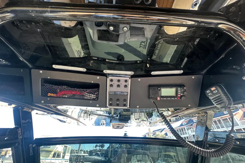 O-sea-d 2 Yacht Photos Pics 2021 Scout 251 XSS boat console with radio and control panel.