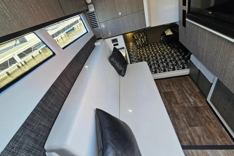  Yacht Photos Pics Luxurious interior of 2022 Monterey 378SS Super Sport boat with modern seating and stylish decor.