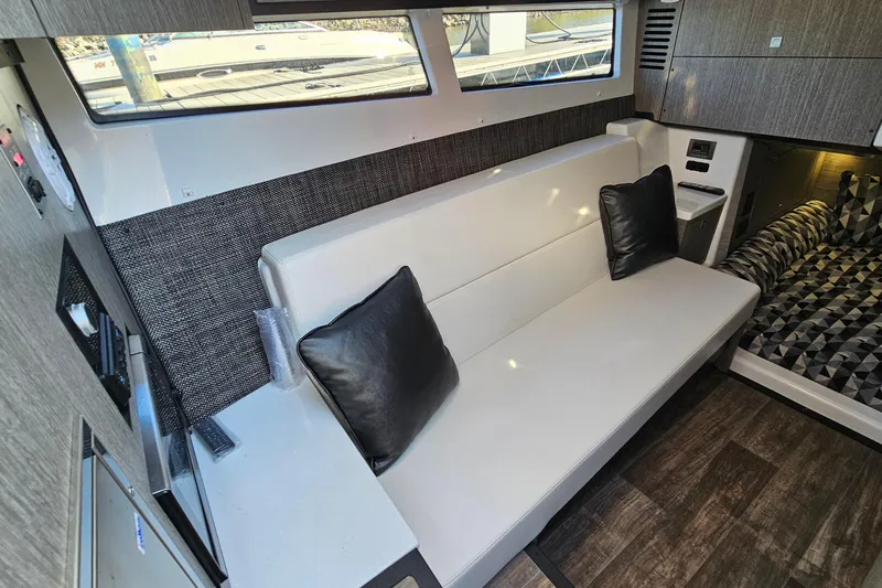  Yacht Photos Pics 2022 Monterey 378SS Super Sport interior with modern seating and stylish decor.