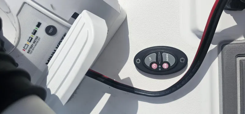  Yacht Photos Pics Control panel on 2023 Caymas 28 HB Twin boat, featuring battery meter and up/down buttons.