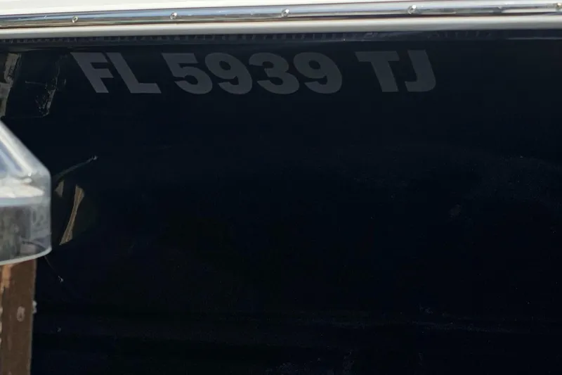  Yacht Photos Pics 2023 Caymas 28 HB Twin boat with registration FL 5939 TJ.