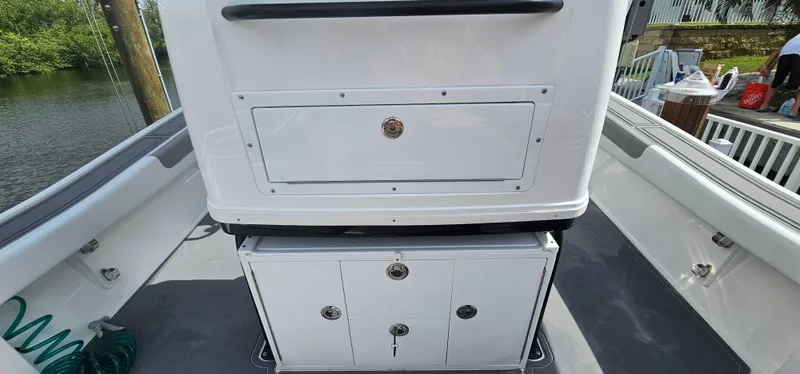  Yacht Photos Pics 2023 Caymas 28 HB Twin boat interior with storage compartments and sleek design.