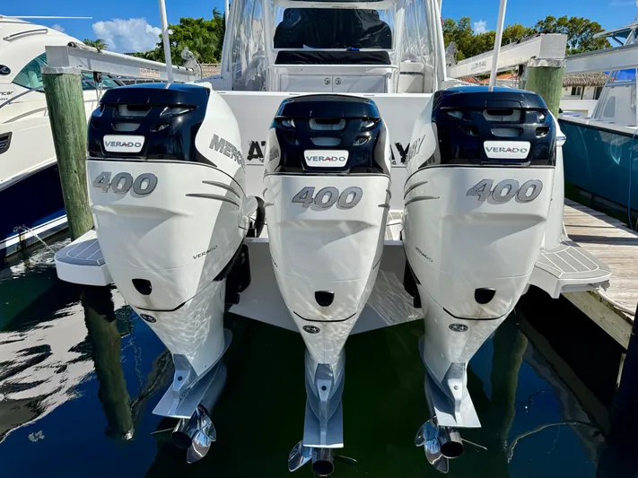  Yacht Photos Pics 2021 Intrepid 409 Valor with triple Mercury Verado 400 engines docked at marina.