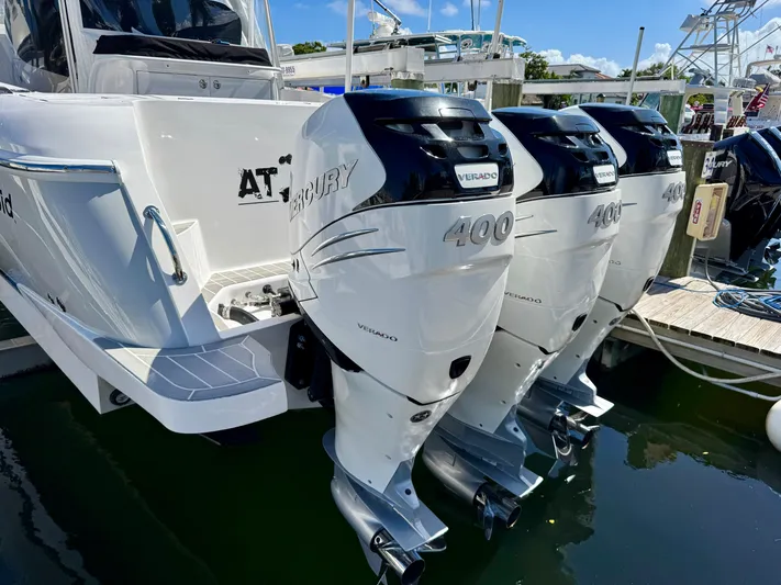  Yacht Photos Pics 2021 Intrepid 409 Valor with triple Mercury 400 outboard engines docked.