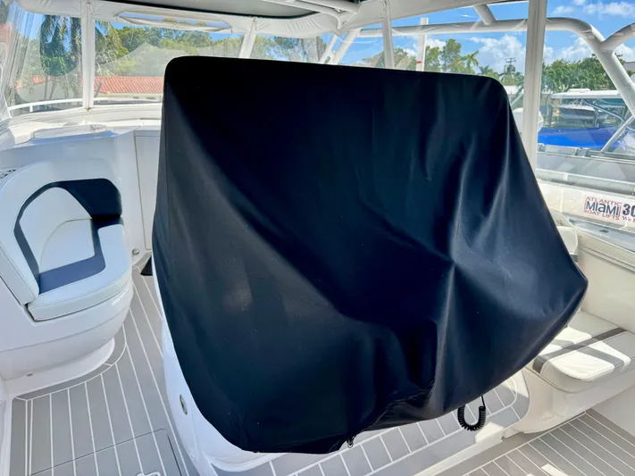  Yacht Photos Pics 2021 Intrepid 409 Valor boat interior with covered helm station.