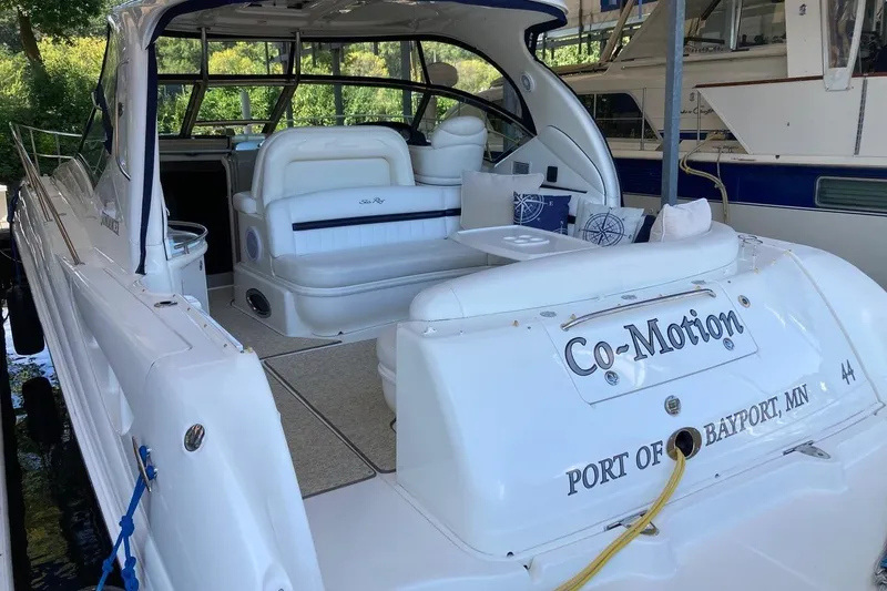 Co-motion Yacht Photos Pics 2008 Sea Ray 44 Sundancer yacht docked, featuring spacious seating and elegant design.